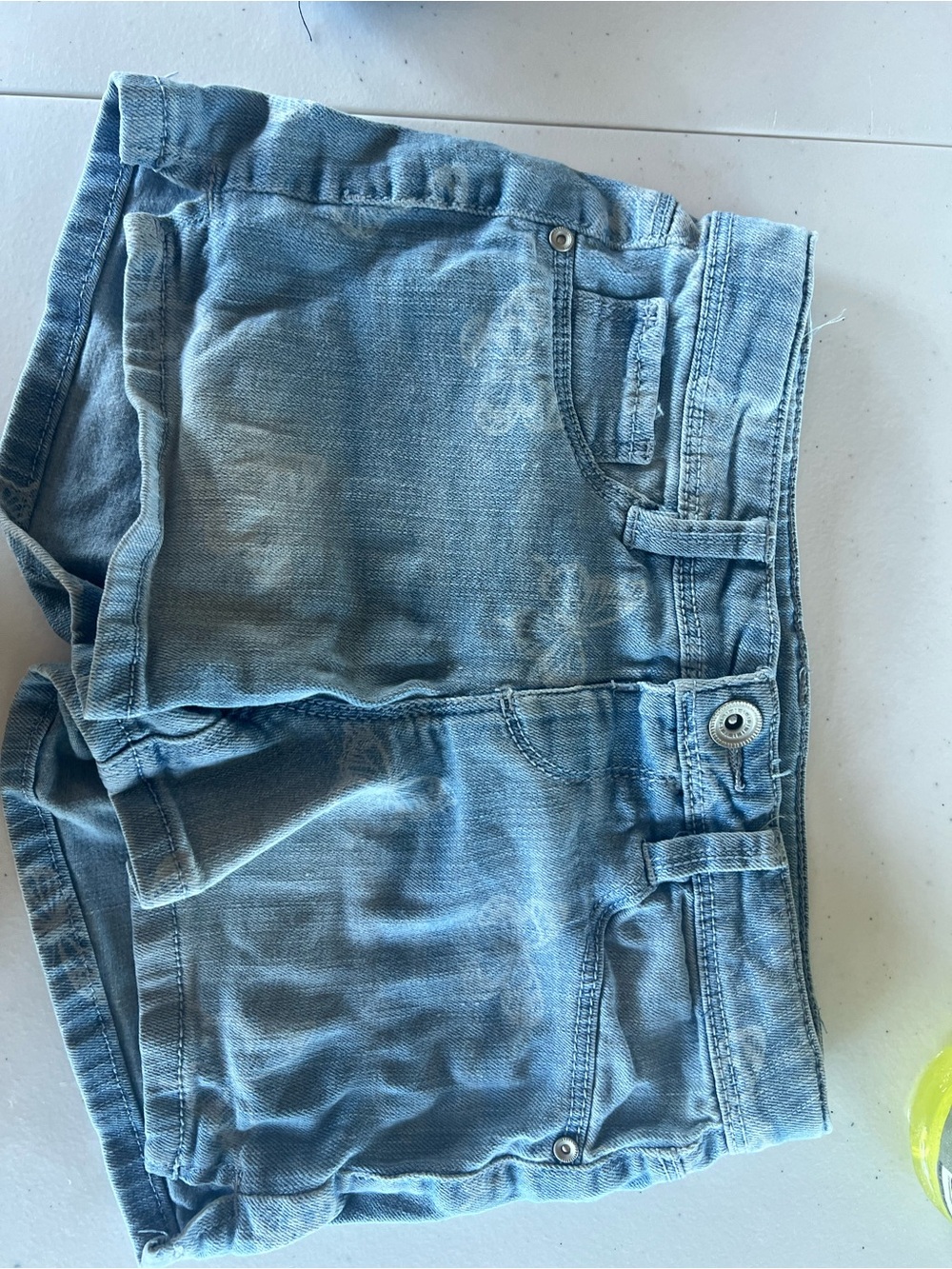 Light Wash Denim Shorts with Subtle Floral Fade